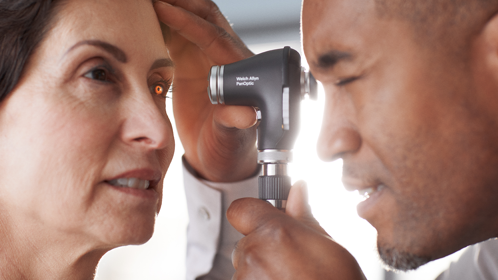 Welch Allyn PanOptic Plus Ophthalmoscope side view in application